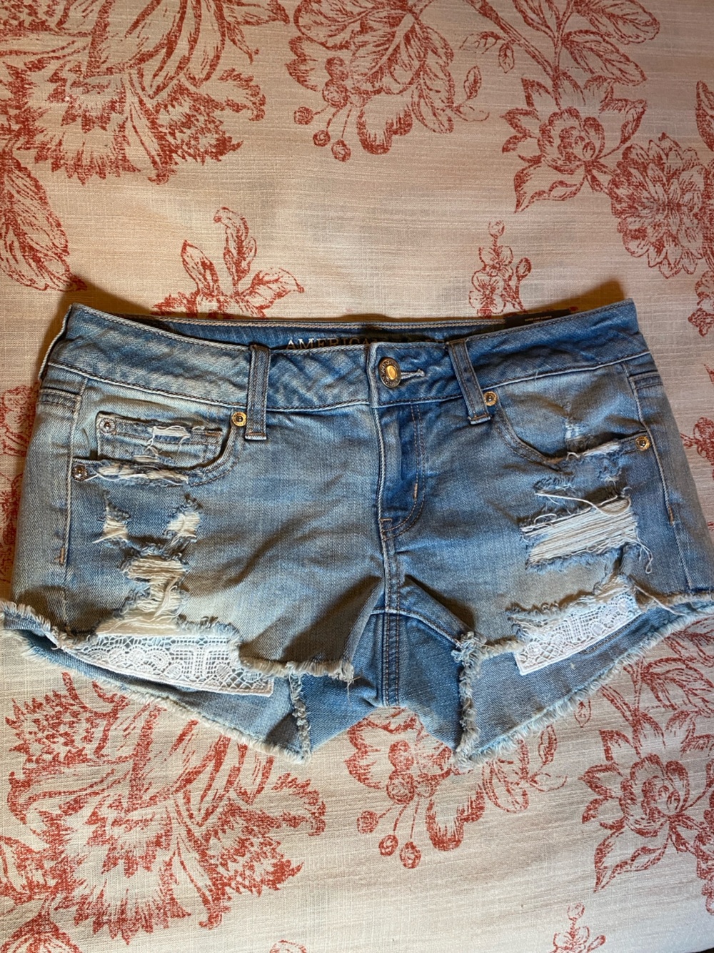 American Eagle Outfitters Light Blue Distressed Denim Shorts with Lace Insets